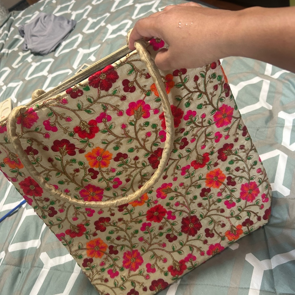 Large size tote bag, heavy thread work with beautiful embroidery in the front.